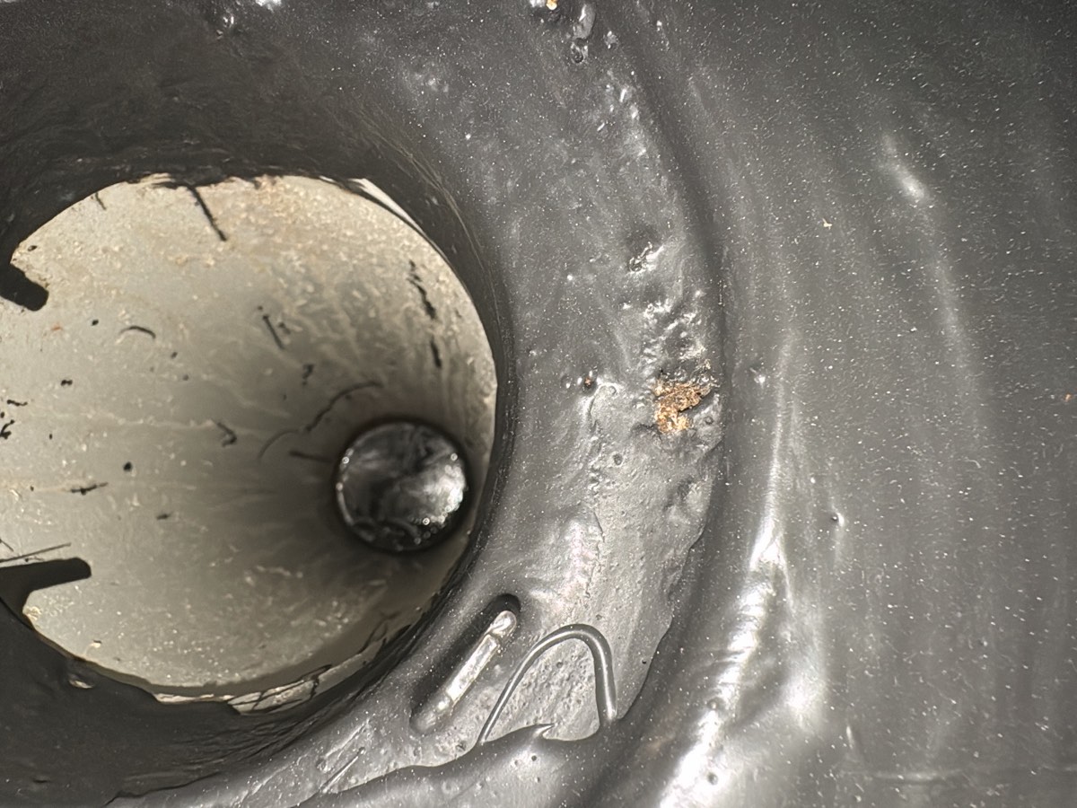 Pinholes to a shower recess, recorded during a fixing stage inspection in Schofields